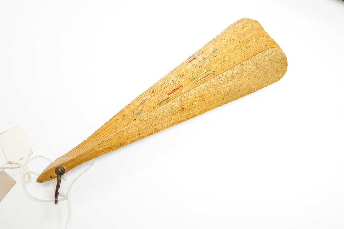 An unusual 19th century Chinese export gilt-decorated tortoiseshell and painted leaf fan, two English fans decorated with paper printed paper crests and a single sided Canton fan leaf lacking sticks, largest 23cm in leng